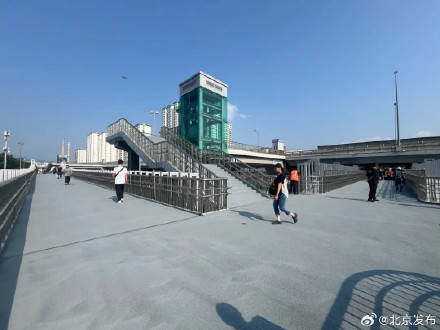 皇冠信用网会员注册网址_北京城区规模最大的“口”字型天桥开通→